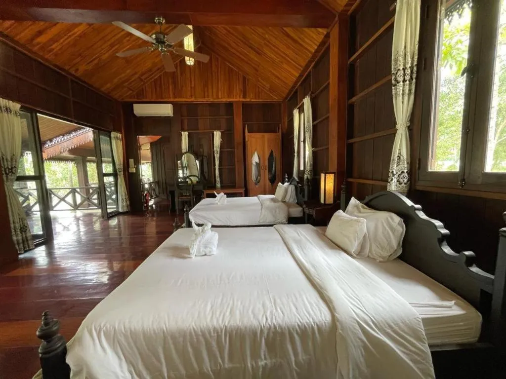 Bed in Nam Ou Riverside Resort