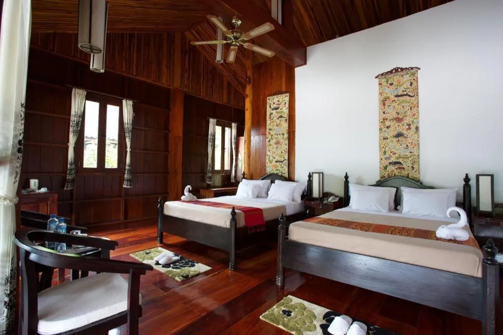 Bed in Nam Ou Riverside Resort