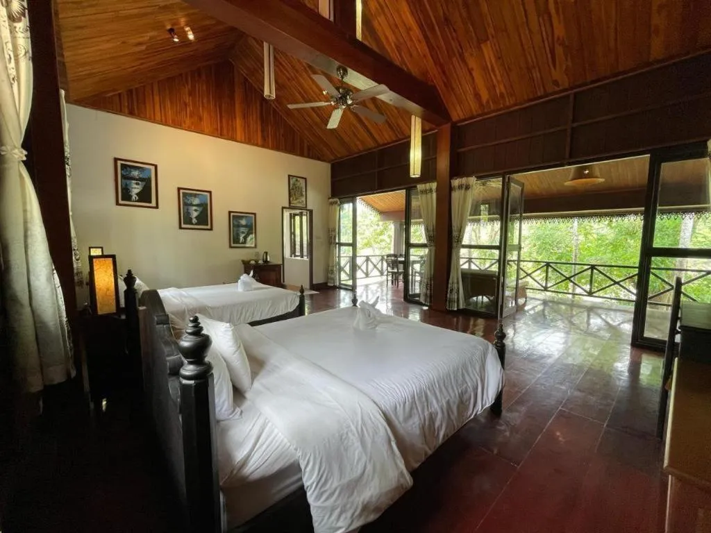 Bed in Nam Ou Riverside Resort