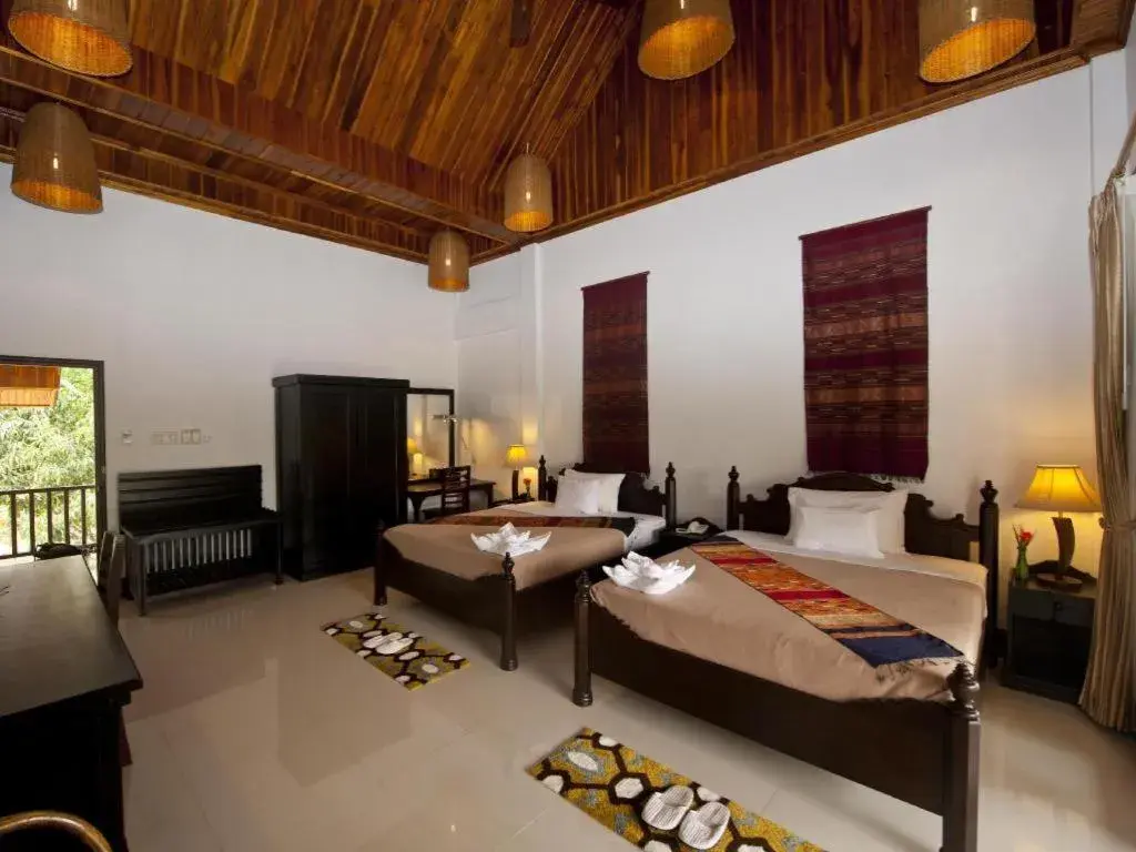 Bed in Nam Ou Riverside Resort Bed in Nam Ou Riverside Resort