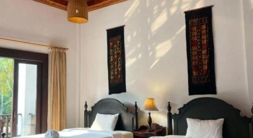 Bed in Nam Ou Riverside Resort