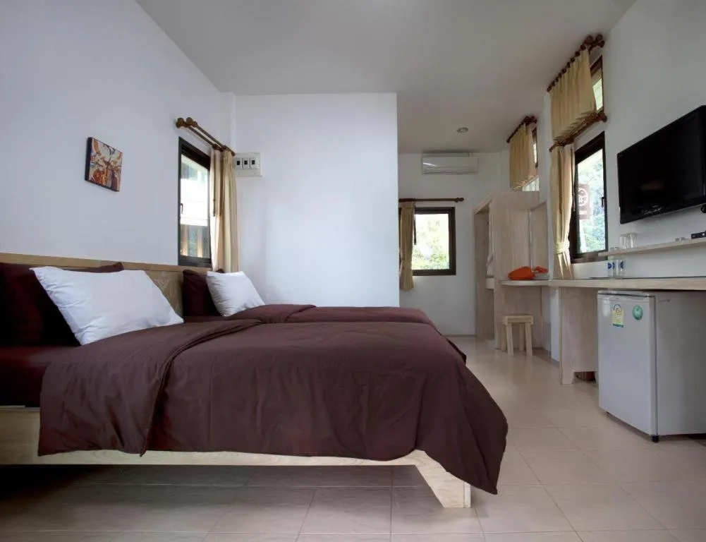 Bed in Na Tara Resort