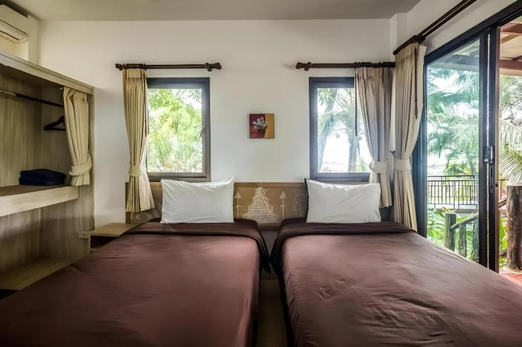 Bed in Na Tara Resort