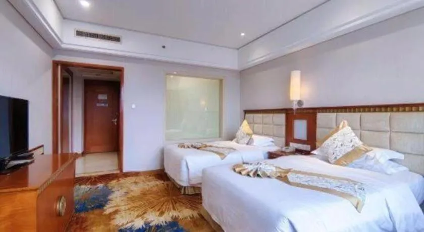 Bed in Zhangjiajie Qinghe Jinjiang International Hotel