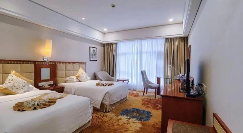 Bed in Zhangjiajie Qinghe Jinjiang International Hotel