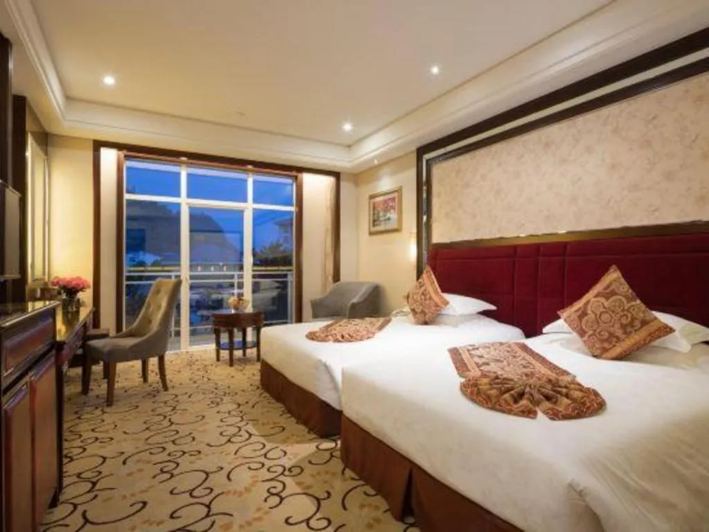 Bed in Zhangjiajie Qinghe Jinjiang International Hotel