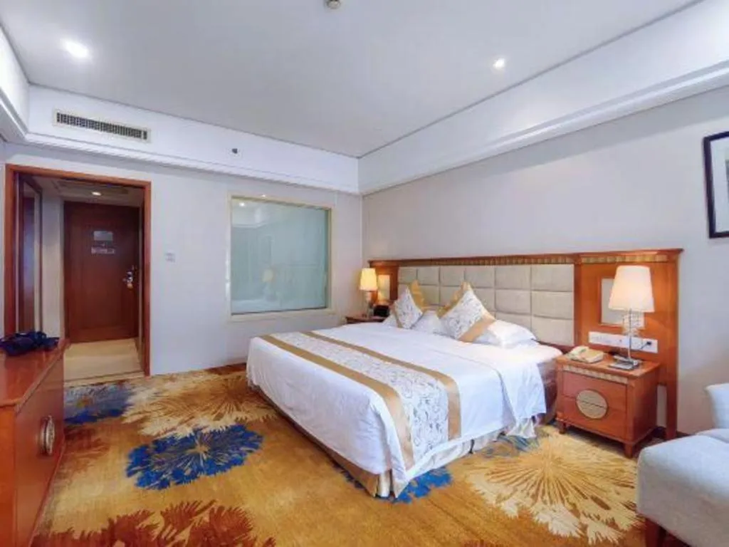 Bed in Zhangjiajie Qinghe Jinjiang International Hotel