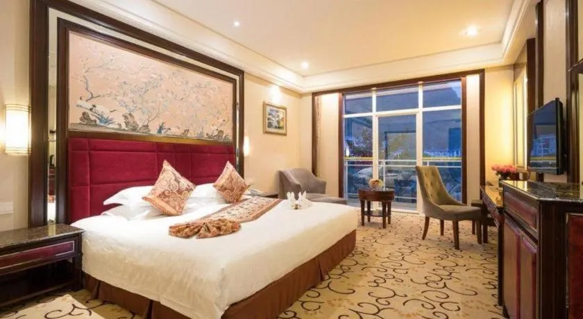 Bed in Zhangjiajie Qinghe Jinjiang International Hotel