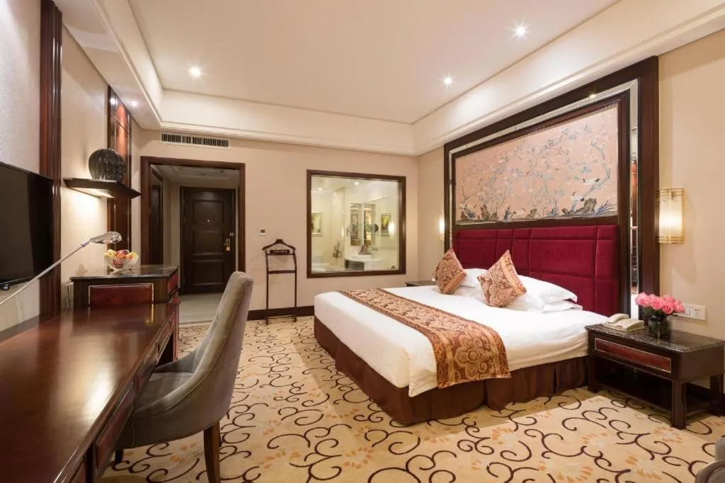 Bed in Zhangjiajie Qinghe Jinjiang International Hotel