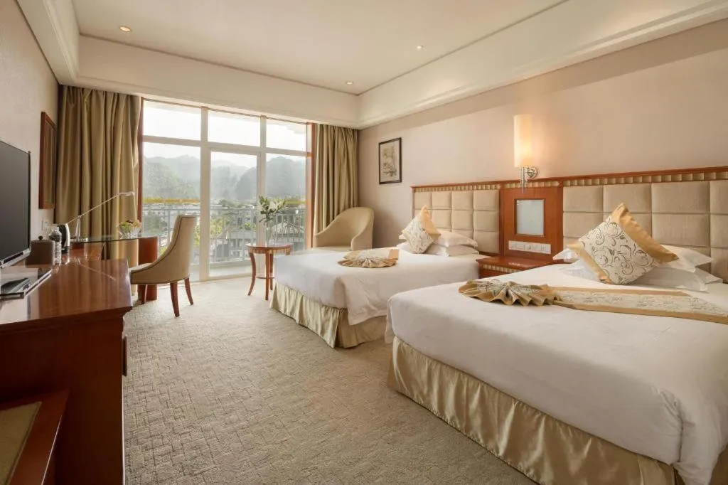 Bed in Zhangjiajie Qinghe Jinjiang International Hotel