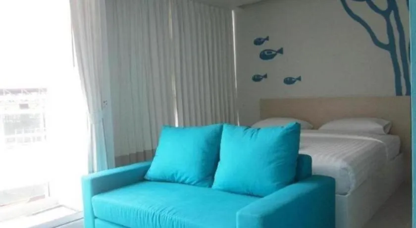 Bed in R-Con Blue Ocean Hotel