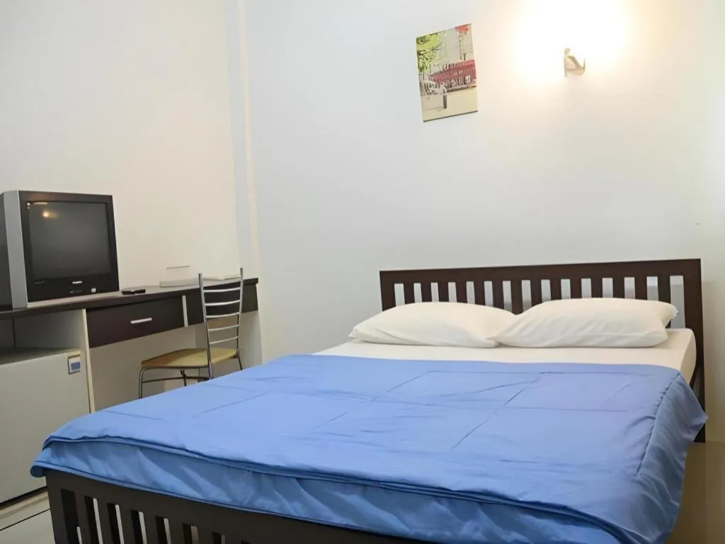 Bed in Chinawat Hotel