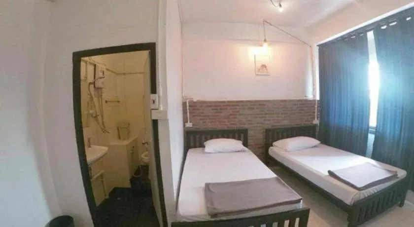 Bed in Chinawat Hotel