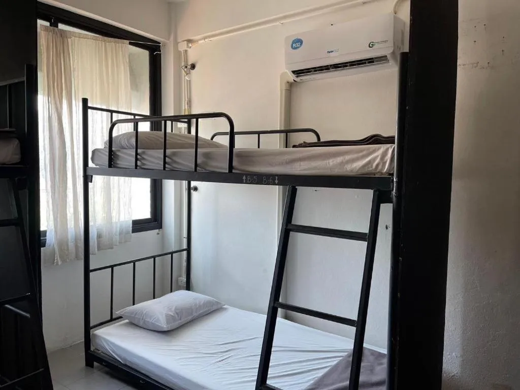 Bed in Chinawat Hotel