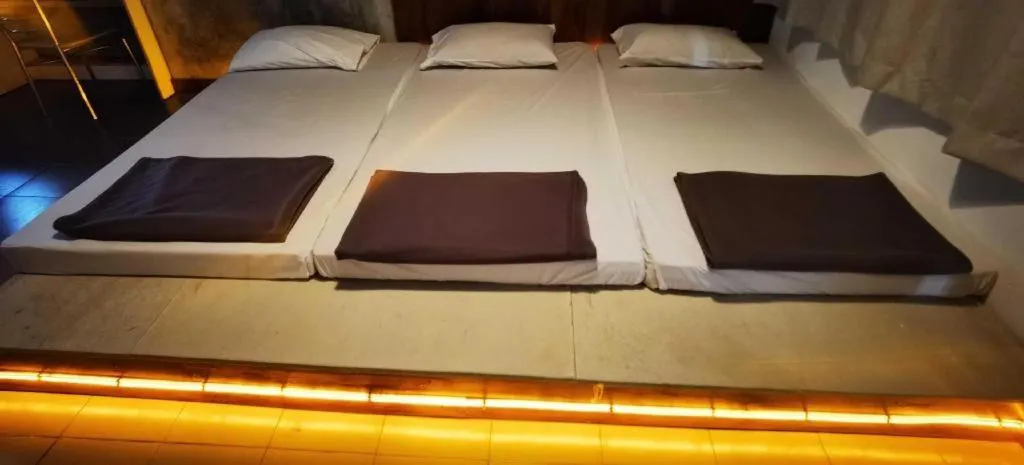 Bed in Chinawat Hotel