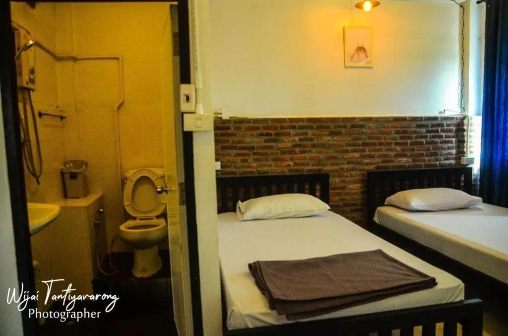 Bed in Chinawat Hotel