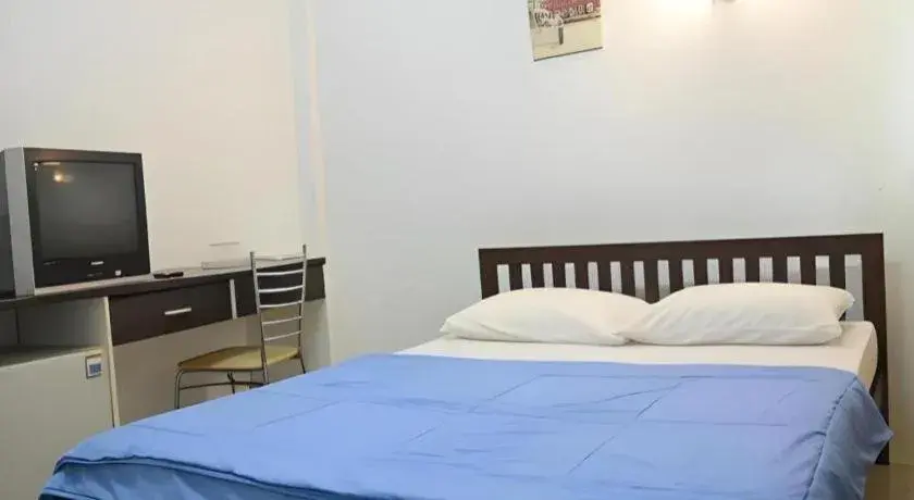 Bed in Chinawat Hotel Bed in Chinawat Hotel