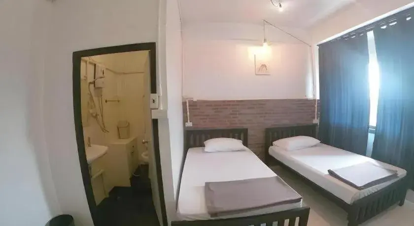 Bed in Chinawat Hotel Bed in Chinawat Hotel