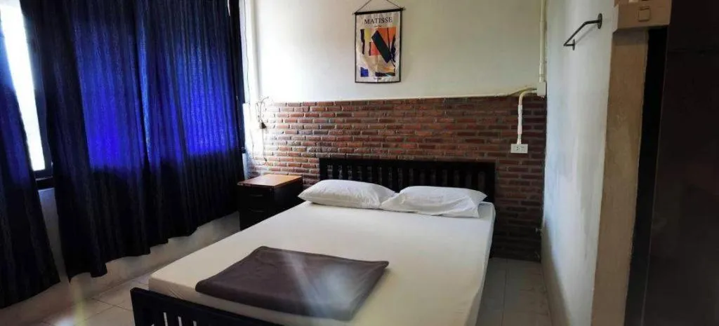 Bed in Chinawat Hotel