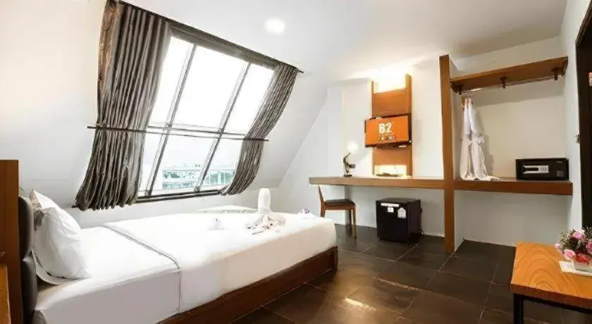 Bed in B2 Bangkok Srinakharin Boutique & Budget Hotel Bed in B2 Bangkok Srinakharin Boutique & Budget Hotel