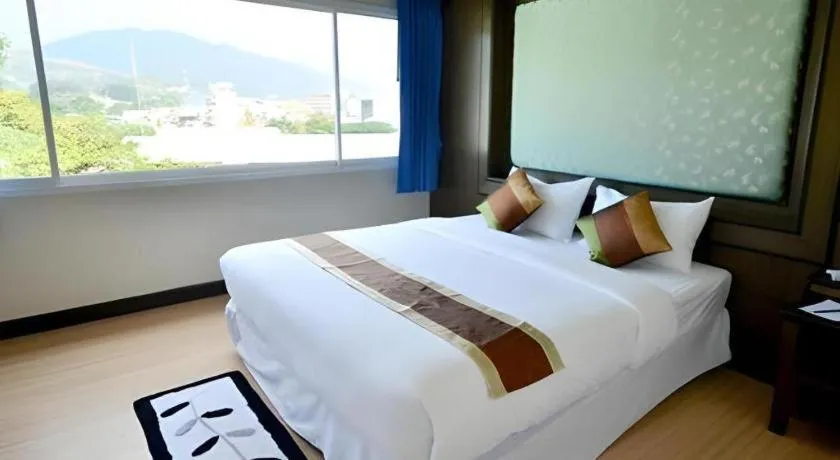 Bed in Piyaporn Pavilion Hotel