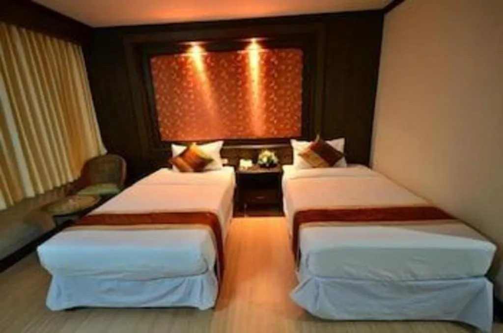 Bed in Piyaporn Pavilion Hotel
