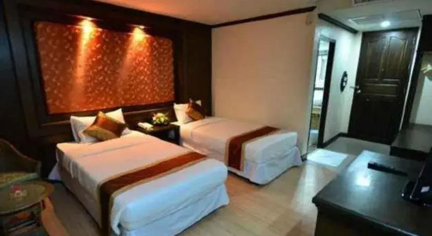 Bed in Piyaporn Pavilion Hotel Bed in Piyaporn Pavilion Hotel