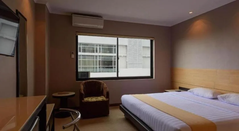 Bed in Gajahmada Avara Boutique Hotel