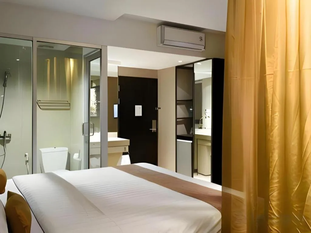 Bed in Gajahmada Avara Boutique Hotel