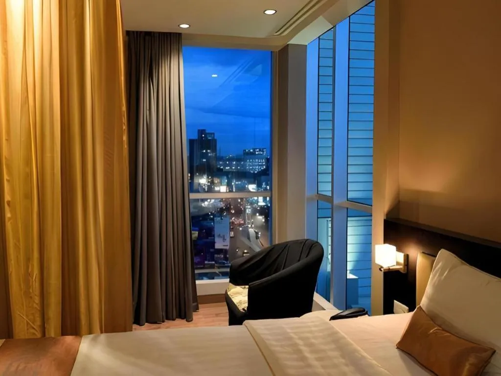 Bed in Gajahmada Avara Boutique Hotel