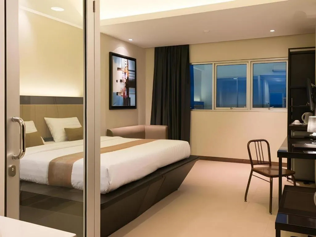 Bed in Gajahmada Avara Boutique Hotel