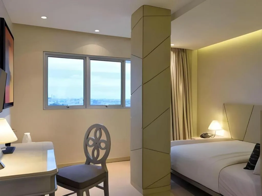 Bed in Gajahmada Avara Boutique Hotel