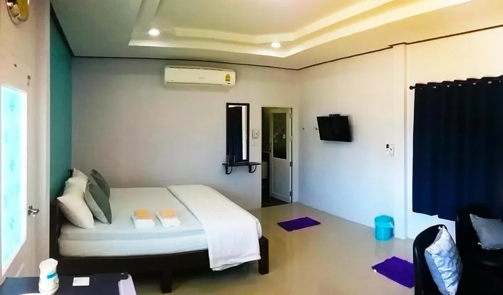 Bed in BanRai ChernMa Resort