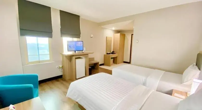 Bed in Orchardz Hotel Gajah Mada Bed in Orchardz Hotel Gajah Mada