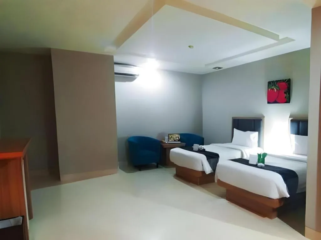 Bed in Orchardz Hotel Gajah Mada