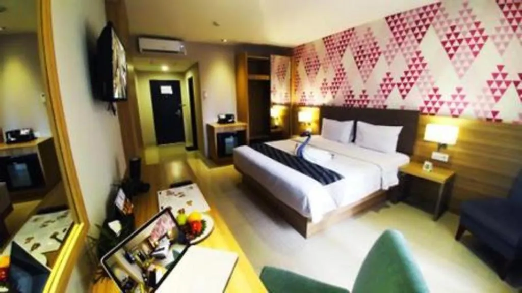 Bed in Orchardz Hotel Gajah Mada