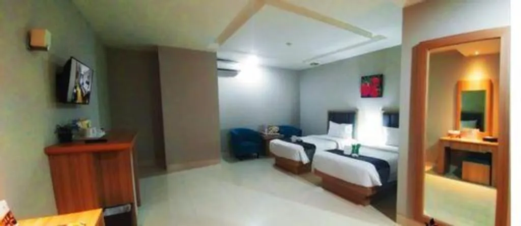 Bed in Orchardz Hotel Gajah Mada