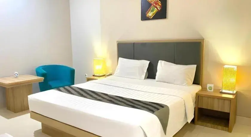 Bed in Orchardz Hotel Gajah Mada Bed in Orchardz Hotel Gajah Mada