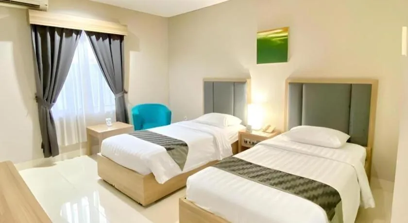 Bed in Orchardz Hotel Gajah Mada