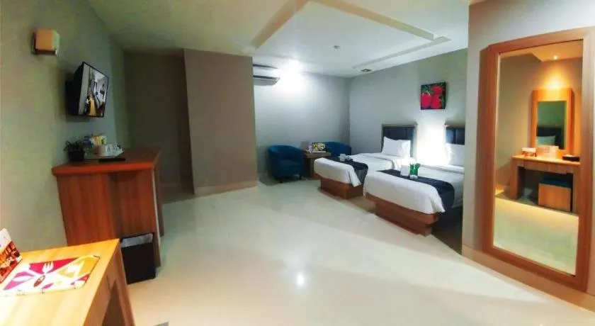 Bed in Orchardz Hotel Gajah Mada