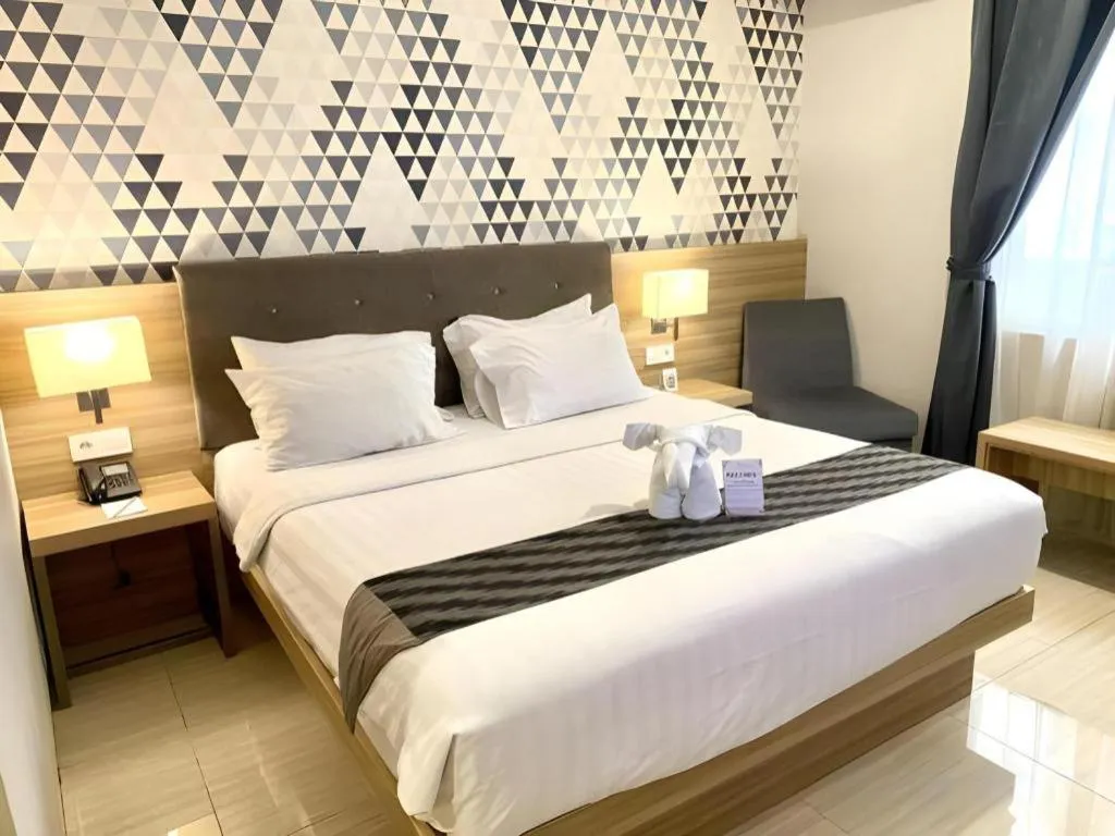 Bed in Orchardz Hotel Gajah Mada