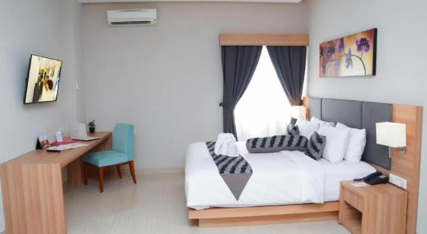 Bed in Orchardz Hotel Gajah Mada