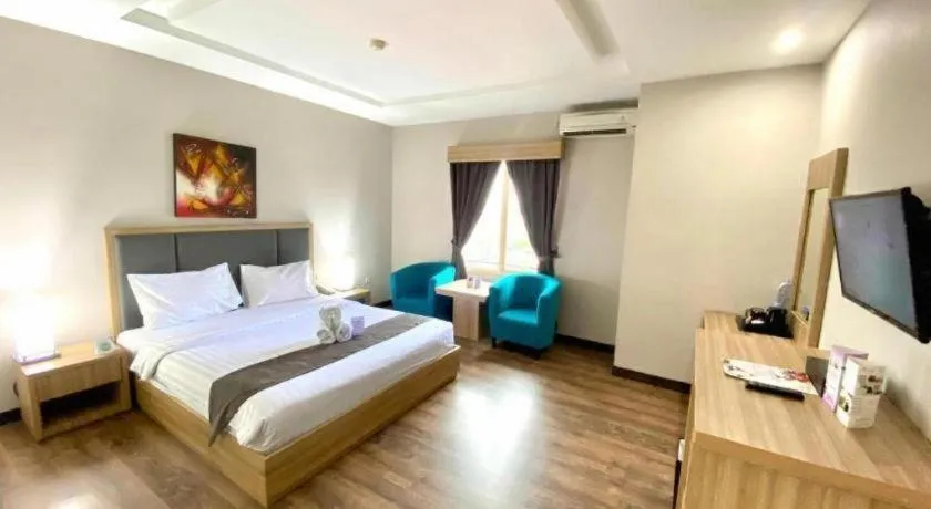 Bed in Orchardz Hotel Gajah Mada