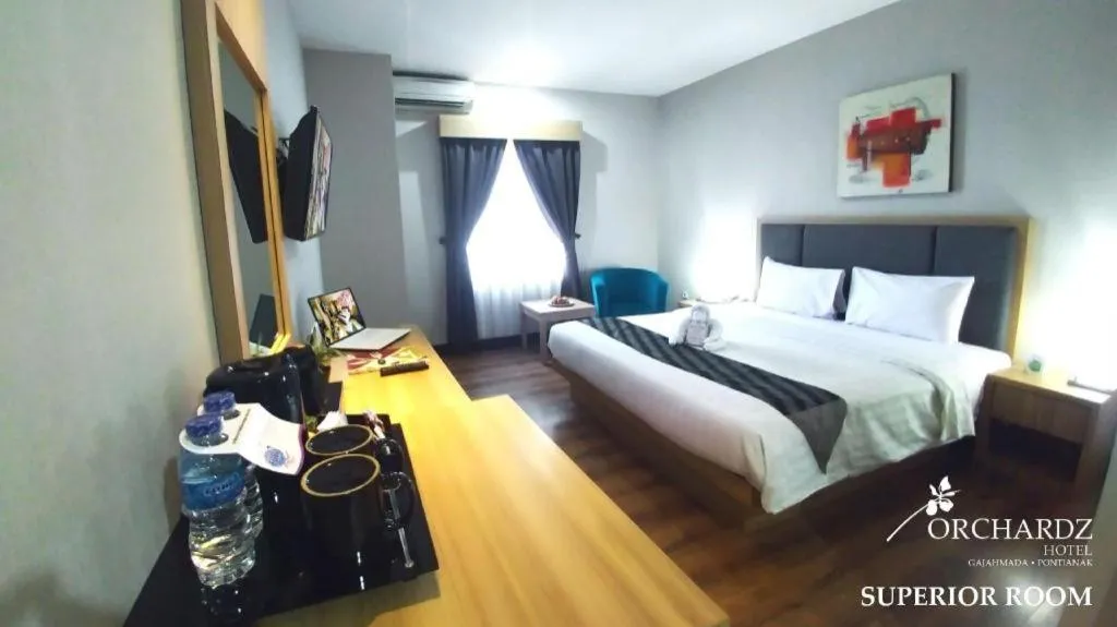 Bed in Orchardz Hotel Gajah Mada