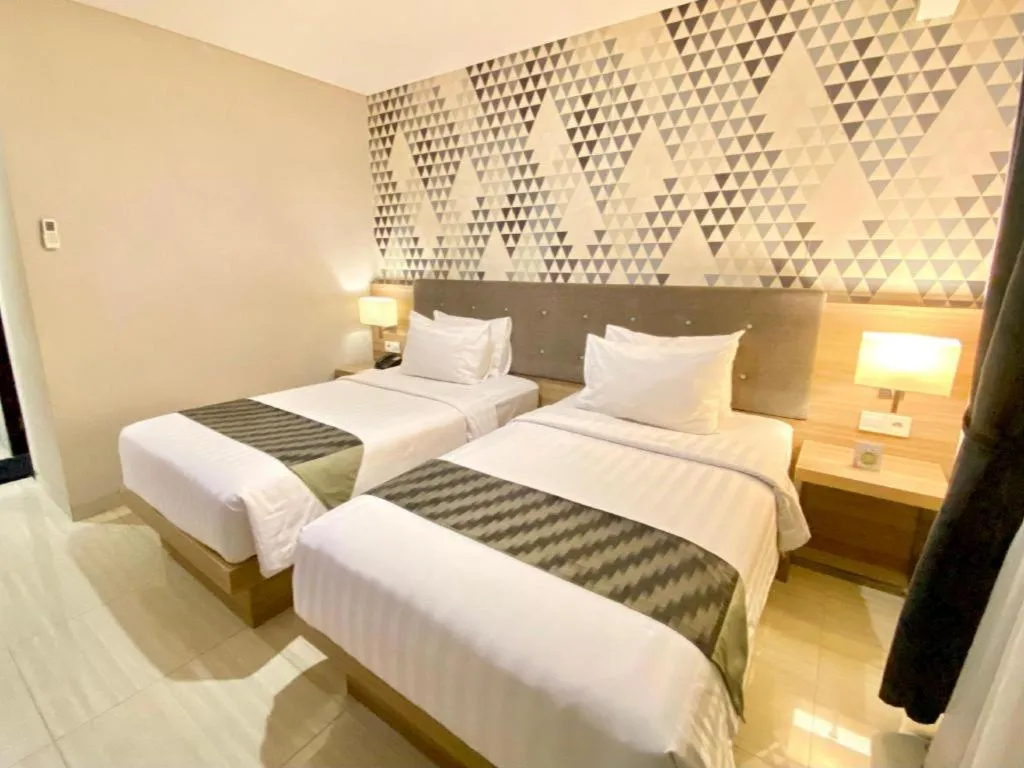 Bed in Orchardz Hotel Gajah Mada