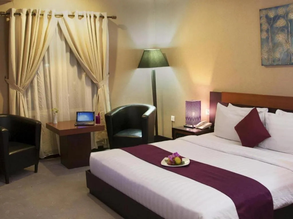 Bed in Orchardz Hotel Gajah Mada