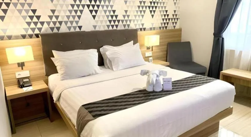 Bed in Orchardz Hotel Gajah Mada