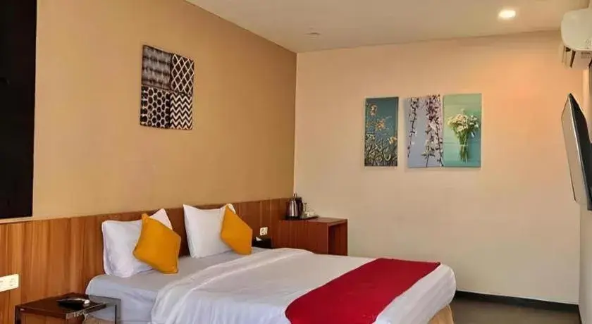 Bed in Garuda Hotel Pontianak Bed in Garuda Hotel Pontianak