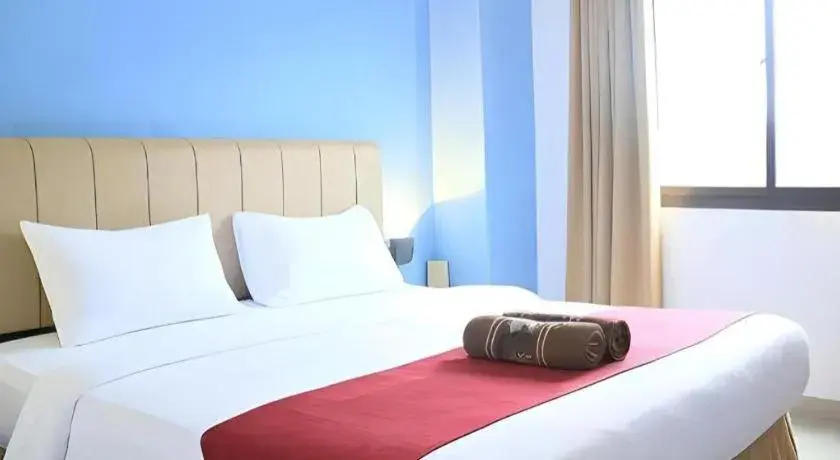 Bed in Garuda Hotel Pontianak Bed in Garuda Hotel Pontianak