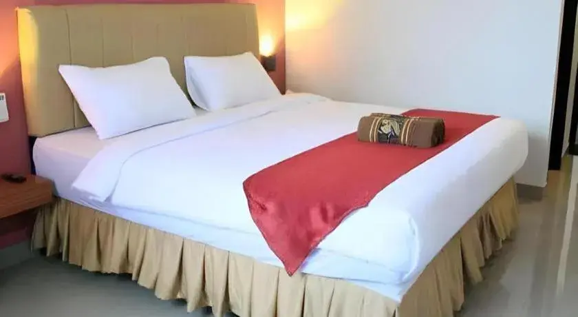 Bed in Garuda Hotel Pontianak Bed in Garuda Hotel Pontianak
